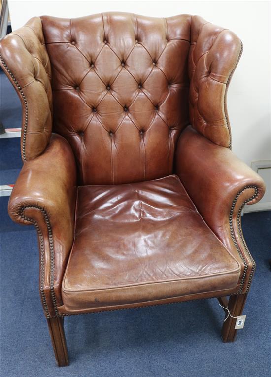 A leather wing chair